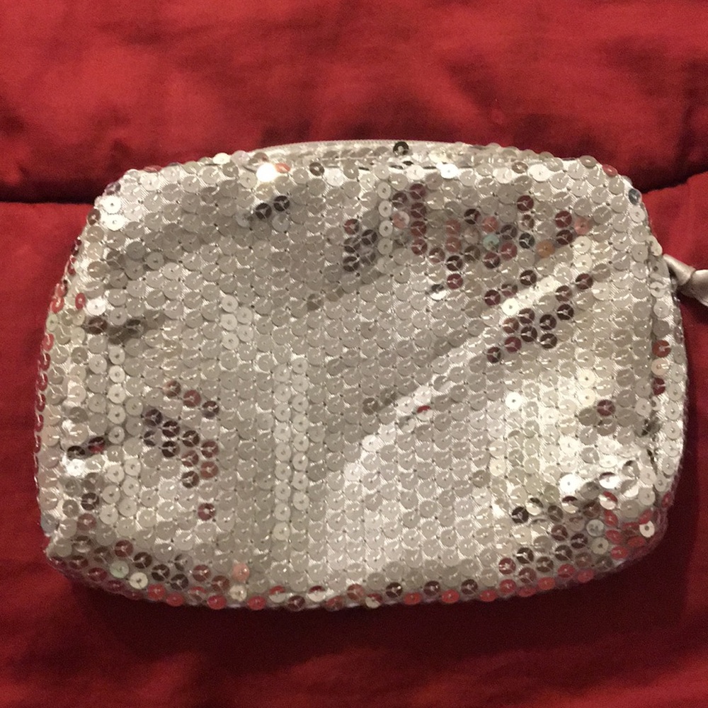 Woman’s silver clutch